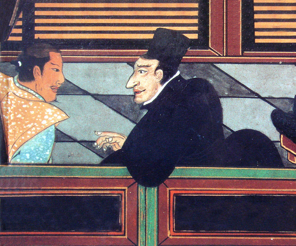 イエズス会員と日本人（1600年ころ）（Wikipediaより20210828ダウンロード）の画像。